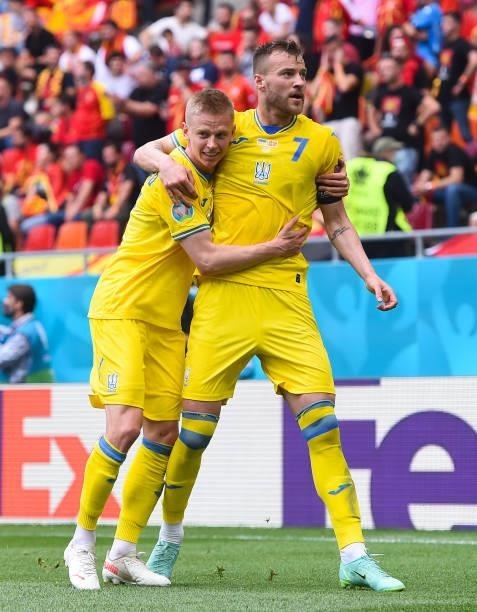Andriy Yarmolenko of Ukraine celebrates with Oleksandr Zinchenko after scoring their side's first goal during the UEFA Euro 2020 Championship Group C...