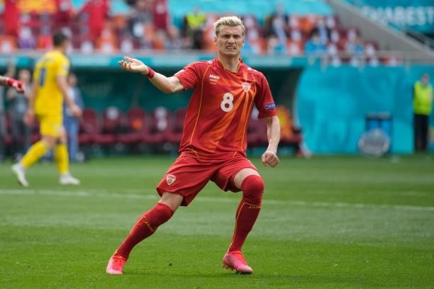 Egzijan Alioski of North Macedonia celebrates after scoring their side's first goal during the UEFA Euro 2020 Championship Group C match between...