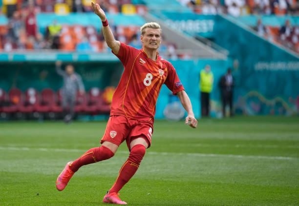 Egzijan Alioski of North Macedonia celebrates after scoring their side's first goal during the UEFA Euro 2020 Championship Group C match between...