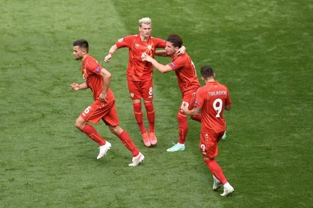 Egzijan Alioski of North Macedonia celebrates with team mates after scoring their side's first goal during the UEFA Euro 2020 Championship Group C...