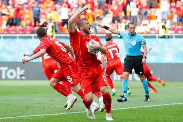 Stefan Ristovski of North Macedonia celebrates his side's first goal scored by team mate Egzijan Alioski during the UEFA Euro 2020 Championship Group...