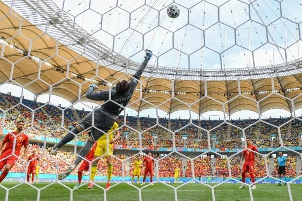 Stole Dimitrievski of North Macedonia makes a save during the UEFA Euro 2020 Championship Group C match between Ukraine and North Macedonia at...