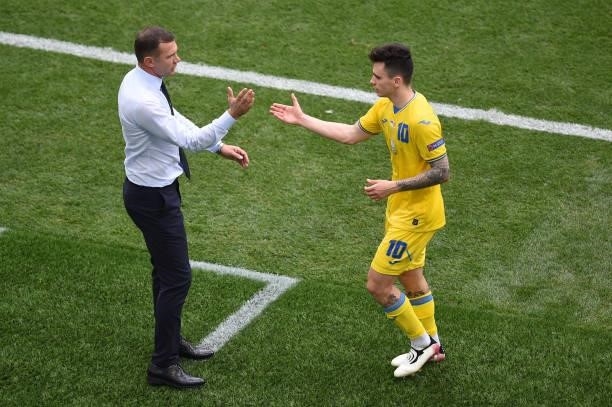 Mykola Shaparenko of Ukraine shakes hands with Andriy Shevchenko, Head Coach of Ukraine after being substituted during the UEFA Euro 2020...