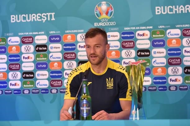 In this handout picture provided by UEFA, Andriy Yarmolenko of Ukraine speaks to the media alongside his Heineken 'Star of the Match' award during...