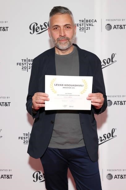 Levan Koguashvili poses with an award at the Tribeca Festival Awards Night during the 2021 Tribeca Festival at Spring Studios on June 17, 2021 in New...