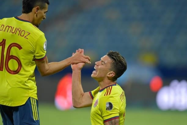 Mateus Uribe of Colombia reacts with teammate Daniel Muñoz during a Group B match between Colombia and Venezuela as part of Copa America Brazil 2021...