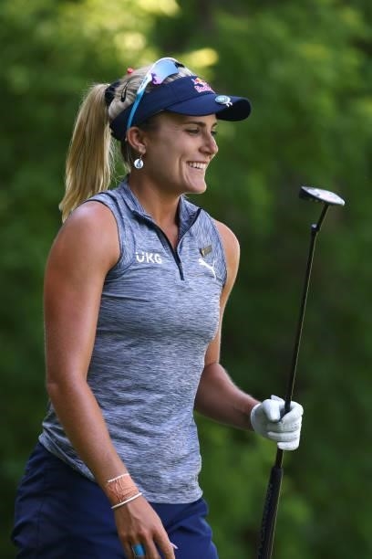 Lexi Thompson watches her tee shot on the seventh hole during round one of the Meijer LPGA Classic for Simply Give at Blythefield Country Club on...