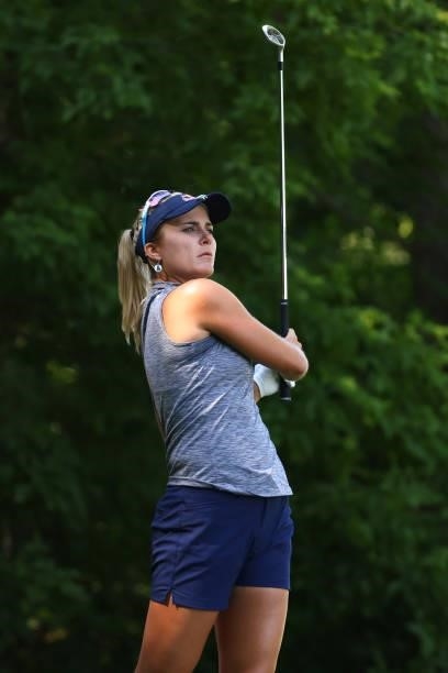 Lexi Thompson watches her tee shot on the seventh hole during round one of the Meijer LPGA Classic for Simply Give at Blythefield Country Club on...
