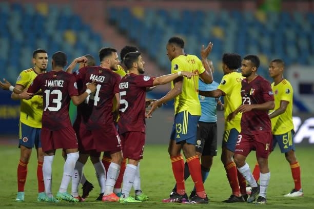Yerry Mina of Colombia argues with Junior Moreno of Venezuela during a Group B match between Colombia and Venezuela as part of Copa America Brazil...