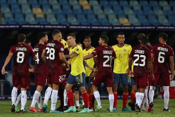 Mateus Uribe of Colombia argues with Romulo Otero of Venezuela during a Group B match between Colombia and Venezuela as part of Copa America Brazil...