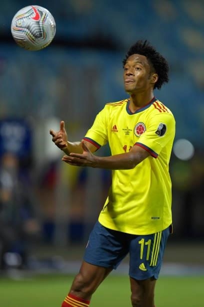 Juan Cuadrado of Colombia handles the ball during a Group B match between Colombia and Venezuela as part of Copa America Brazil 2021 at Estadio...
