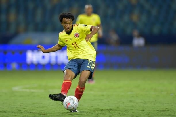 Juan Cuadrado of Colombia kicks the ball during a Group B match between Colombia and Venezuela as part of Copa America Brazil 2021 at Estadio...