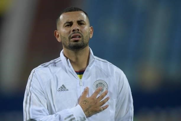Edwin Cardona of Colombia sings the national anthem prior to a Group B match between Colombia and Venezuela as part of Copa America Brazil 2021 at...