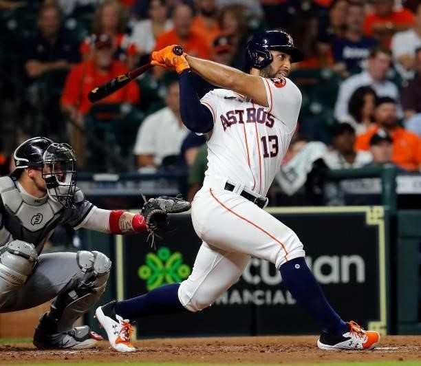 Abraham Toro of the Houston Astros singles in a run in the fourth inning against the Chicago White Sox at Minute Maid Park on June 17, 2021 in...