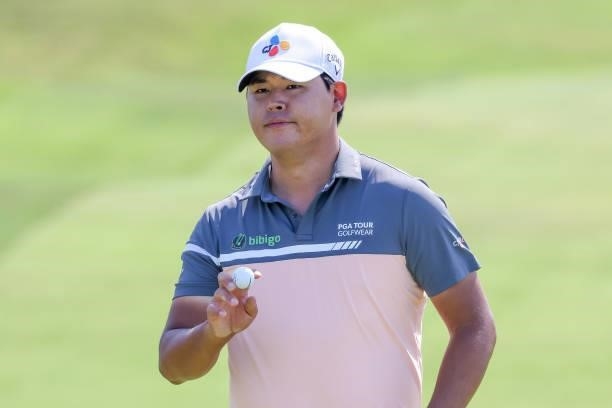 Si Woo Kim of South Korea reacts to a birdie on the first green during the first round of the 2021 U.S. Open at Torrey Pines Golf Course on June 17,...