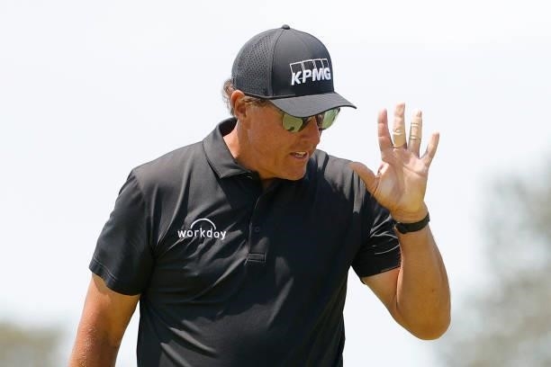 Phil Mickelson of the United States waves after making birdie on the 17th hole during the first round of the 2021 U.S. Open at Torrey Pines Golf...