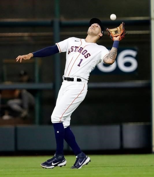 Carlos Correa of the Houston Astros catches an infield pop fly off the bat of Tim Anderson of the Chicago White Sox at Minute Maid Park on June 17,...