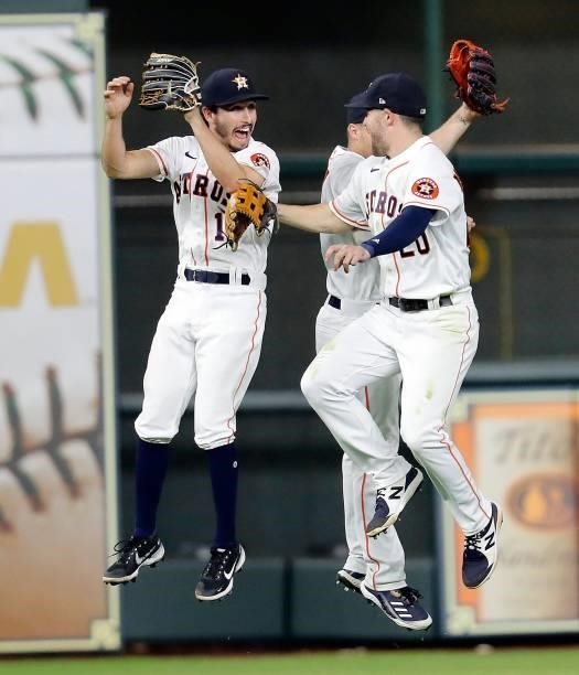 Garrett Stubbs of the Houston Astros celebrates with Chas McCormick and Myles Straw in the outfield after the final out against the Chicago White Sox...
