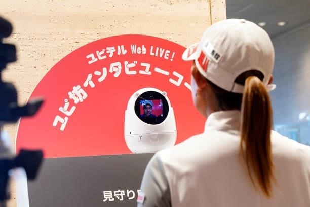 Julia Kurata of Japan attends an online press conference using 'Yupi-bo' monitoring robot during the first round of the Yupiteru Shizuoka Shimbun SBS...