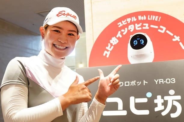 Julia Kurata of Japan attends an online press conference using 'Yupi-bo' monitoring robot during the first round of the Yupiteru Shizuoka Shimbun SBS...