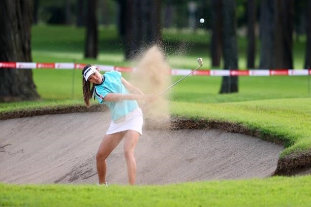 Eimi Koga of the United States hits out from a bunker on the 18th hole during the first round of Nichirei Ladies at Sodegaura Country Club Shinsode...