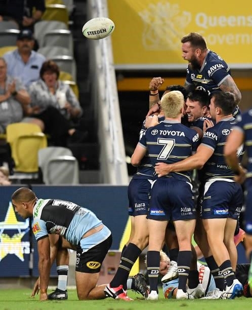 Francis Molo of the Cowboys celebrates after scoring a try during the round 15 NRL match between the North Queensland Cowboys and the Cronulla Sharks...