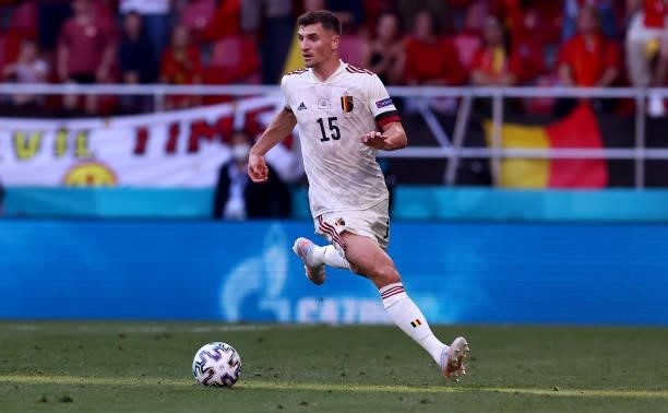 Thomas Meunier of Belgium runs with the ball during the UEFA Euro 2020 Championship Group B match between Denmark and Belgium on June 17, 2021 in...