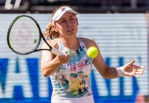 Ekaterina Alexandrova of Russia plays a forehand against Belinda Bencic of Switzerland in the women's singles quarter final match during day 7 of the...