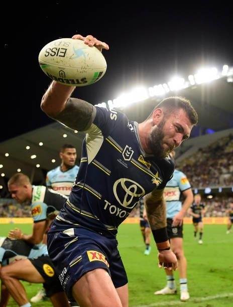 Kyle Feldt of the Cowboys celebrates after scoring a try during the round 15 NRL match between the North Queensland Cowboys and the Cronulla Sharks...