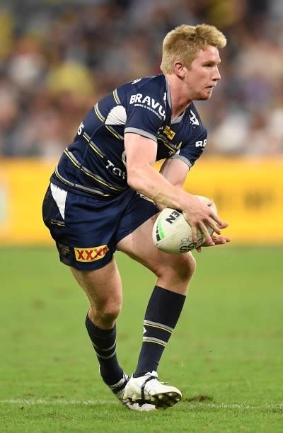 Tom Dearden of the Cowboys runs the ball during the round 15 NRL match between the North Queensland Cowboys and the Cronulla Sharks at QCB Stadium,...