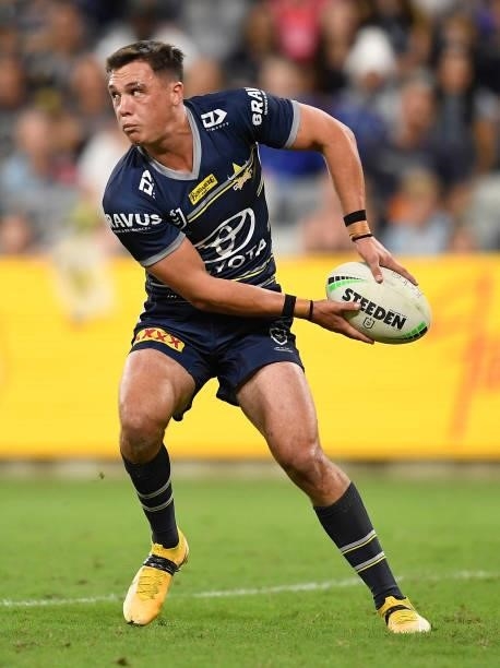 Scott Drinkwater of the Cowboys looks to pass the ball during the round 15 NRL match between the North Queensland Cowboys and the Cronulla Sharks at...