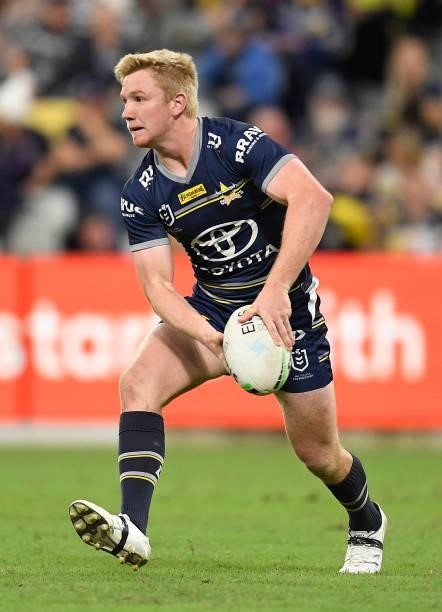 Tom Dearden of the Cowboys passes the ball during the round 15 NRL match between the North Queensland Cowboys and the Cronulla Sharks at QCB Stadium,...