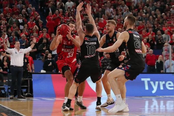 John Mooney of the Wildcats looks to pass the ball during game one of the NBL Grand Final Series between the Perth Wildcats and Melbourne United at...
