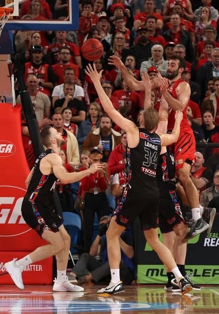 John Mooney of the Wildcats passes the ball during game one of the NBL Grand Final Series between the Perth Wildcats and Melbourne United at RAC...