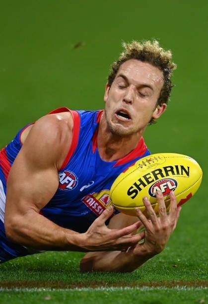 Mitch Wallis of the Bulldogs marks during the round 13 AFL match between the Geelong Cats and the Western Bulldogs at GMHBA Stadium on June 18, 2021...