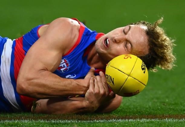 Mitch Wallis of the Bulldogs marks during the round 13 AFL match between the Geelong Cats and the Western Bulldogs at GMHBA Stadium on June 18, 2021...
