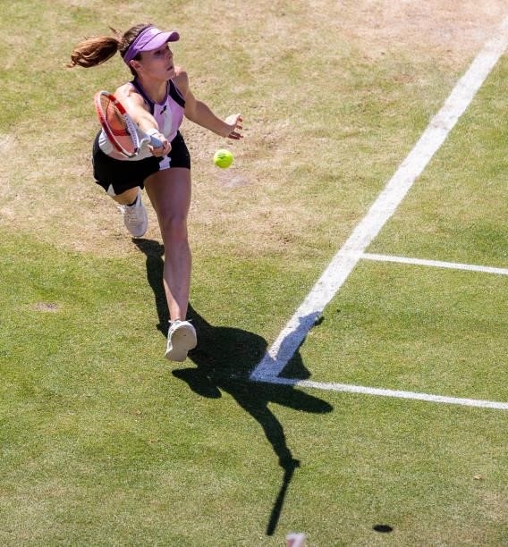 Alize Cornet of France hits a forehand against Garbine Muguruza of Spain in the women's singles quarter final match during day 7 of the bett1open at...