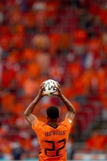 Denzel Dumfries of Netherlands takes a throw in during the UEFA Euro 2020 Championship Group C match between the Netherlands and Austria at Johan...