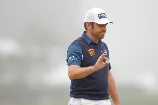 Louis Oosthuizen of South Africa waves after putting on the ninth hole during the first round of the 2021 U.S. Open at Torrey Pines Golf Course on...