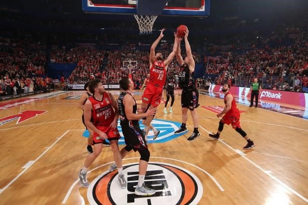Todd Blanchfield of the Wildcats and Mitch McCarron of Melbourne United contest for a rebound during game one of the NBL Grand Final Series between...