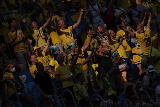 Sweden fans cheer their team during the UEFA Euro 2020 Championship Group E match between Sweden and Slovakia at Saint Petersburg Stadium on June 18,...