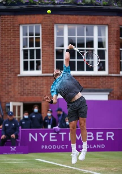 Cameron Norrie of Great Britain serves during his Quarter-final match against Jack Draper of Great Britain during Day 5 of The cinch Championships at...