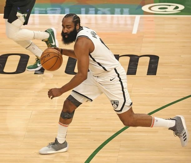 James Harden of the Brooklyn Nets brings the ball up the court against the Milwaukee Bucks at Fiserv Forum on June 17, 2021 in Milwaukee, Wisconsin....