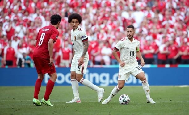 Axel Witsel of Belgium and Eden Hazard of Belgium battle for the ball with Thomas Delaney of Denmark during the UEFA Euro 2020 Championship Group B...