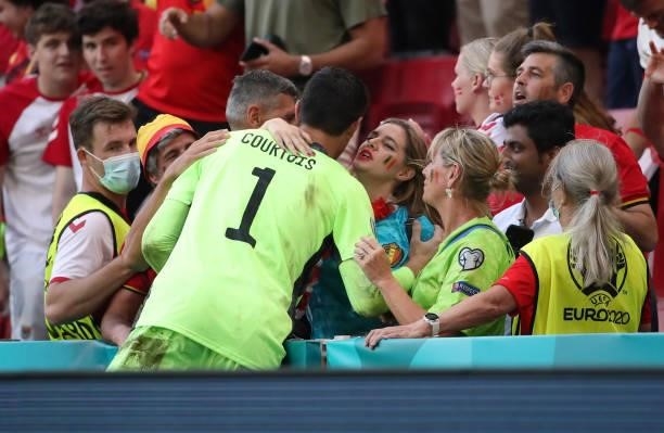 Thibaut Courtois of Belgium celebrates with his sister Valerie after winning the UEFA Euro 2020 Championship Group B match between Denmark and...