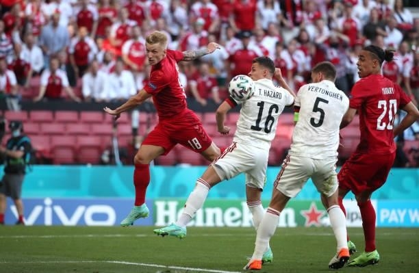 Daniel Wass of Denmark battles for the ball with Thorgan Hazard of Belgium during the UEFA Euro 2020 Championship Group B match between Denmark and...