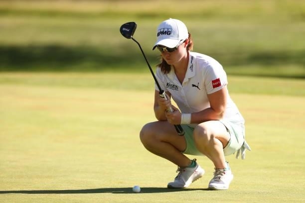 Leona Maguire of Ireland reads a putt on the third green during round two of the Meijer LPGA Classic for Simply Give at Blythefield Country Club on...