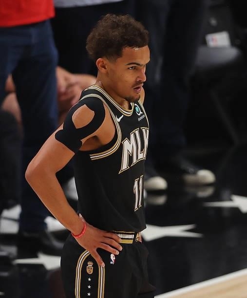 Trae Young of the Atlanta Hawks reacts after drawing a foul against the Philadelphia 76ers during the first half of game 6 of the Eastern Conference...