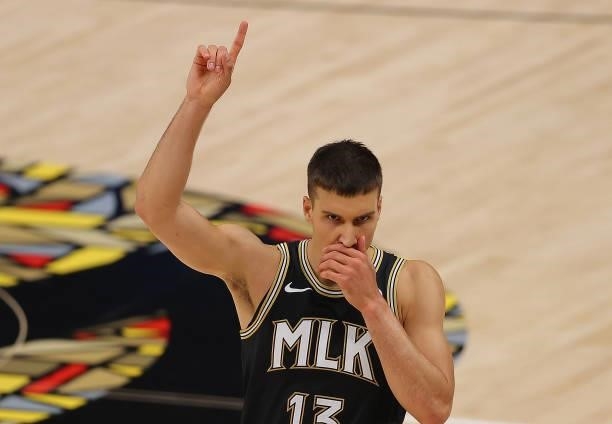 Bogdan Bogdanovic of the Atlanta Hawks reacts after being charged with a foul against the Philadelphia 76ers during the first half of game 6 of the...
