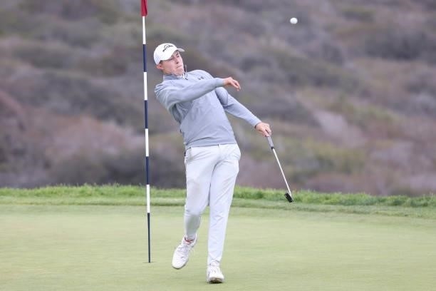 Matt Fitzpatrick of England tosses his golf ball in reaction to his bogey on the third green during the second round of the 2021 U.S. Open at Torrey...